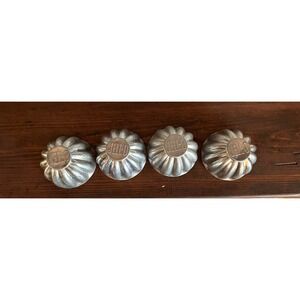 Vintage lot of 4 Jello Molds with Jello stamped on them'